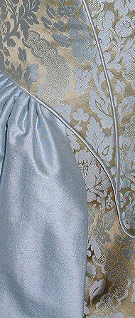 detail of bodice piping in pale blue satin