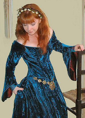 blue-green velvet medieval gown with red accents
