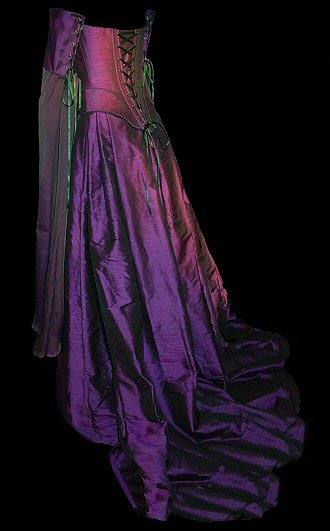 corset in purple silk, fully boned and laced. Gauntlet style seperate sleeves with flowing chiffon mediaeval drapes. Matching silk skirt with small train.