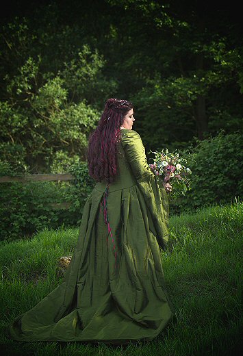 forest gteen medieval style wedding dress with hanging sleeves and contrasting embroidered panels