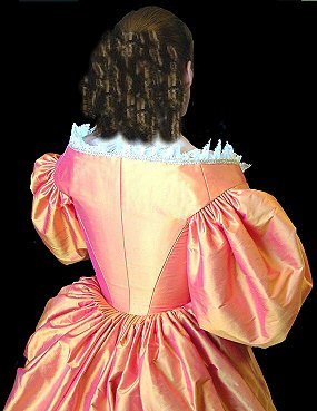 back view of Charles II gown with hand-pleated skirt