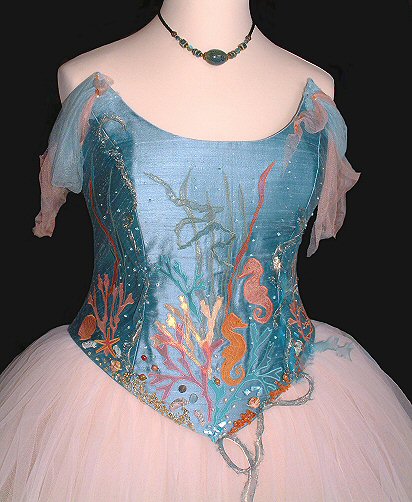 Seashore decorated corset in shades of pale turquoise, soft terracotta, gold