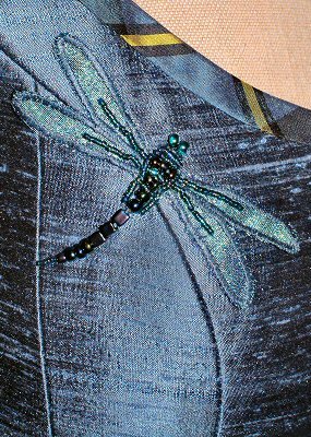 dragonfly detail on shoulder