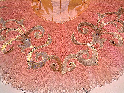 peach and pink tutu with gold decoration and beading