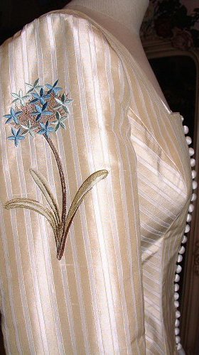 button fastening to victorian style wedding jacket