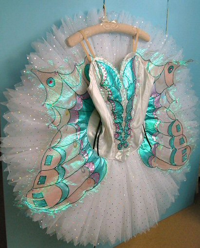 white classical ballet tutu with crystal and iridescent applique decoration