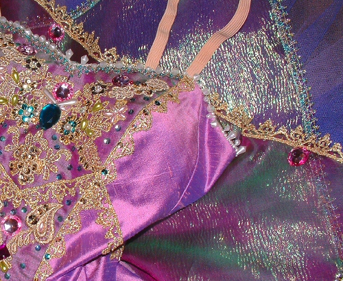 Bell shaped tutu designed as a Sleeping Beauty fairy in shades of lilac, green and gold