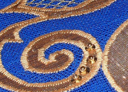 detail of tutu bodice decoration in gold appliqué