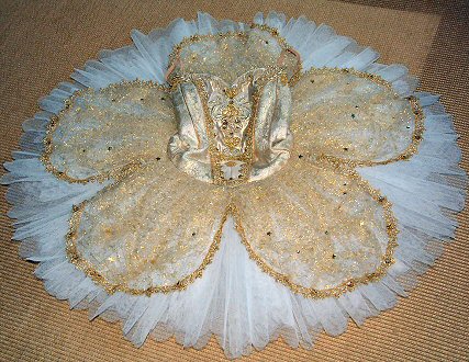 classical ballet tutu in ivory and white with gold decoration