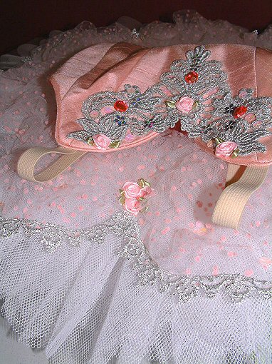pink silk and spotted tulle classical ballet tutu with rosebud decoration