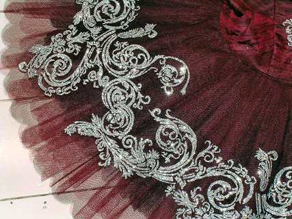 detail of tutu decoration in silver on wine
